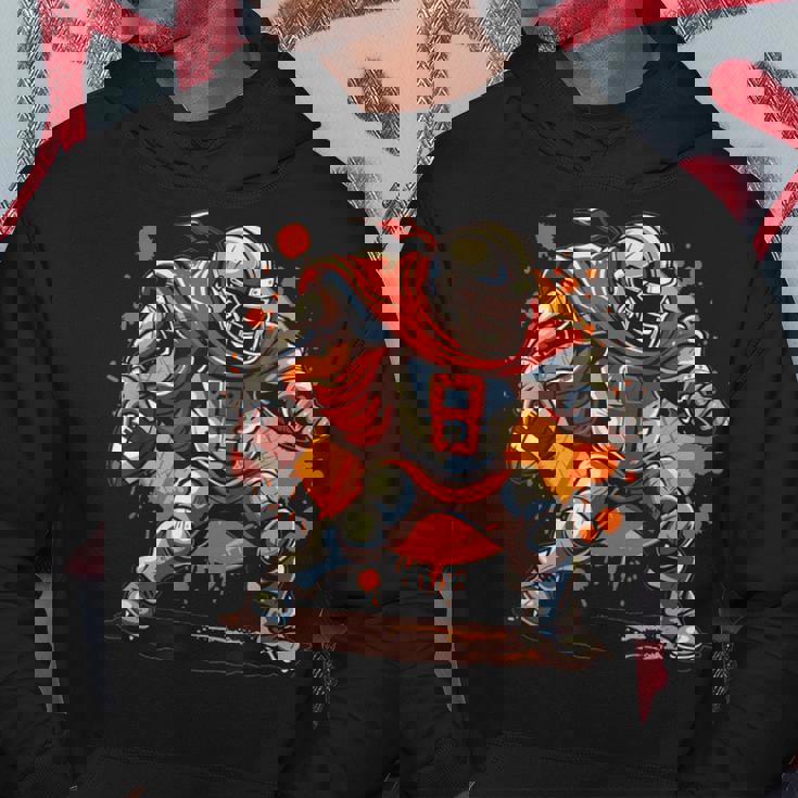 アメリカンフットボールのコスチュームを着たストロングナイト。 パーカー 面白い贈り物