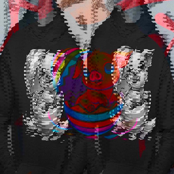 イースターエッグのかわいい赤ちゃん豚の漫画アート。 パーカー 面白い贈り物