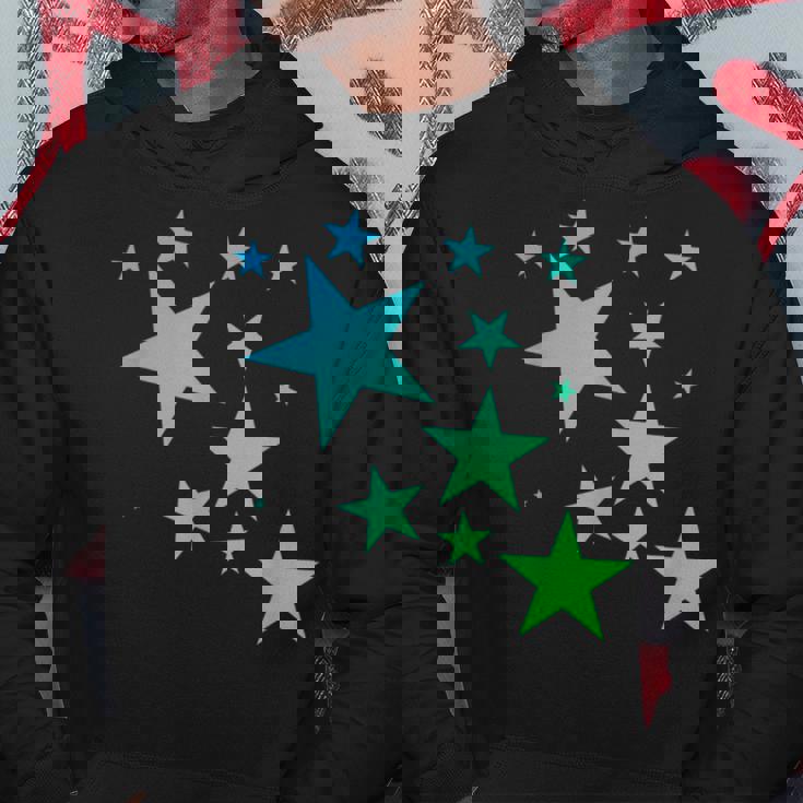 カラフルなグリーンブルーの星、星柄デザイン。 パーカー 面白い贈り物