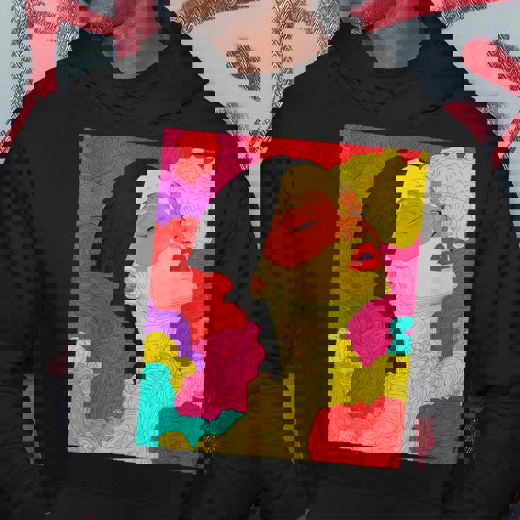 カラフルなドリームスケープ – シュールな顔と抽象的な波 パーカー 面白い贈り物