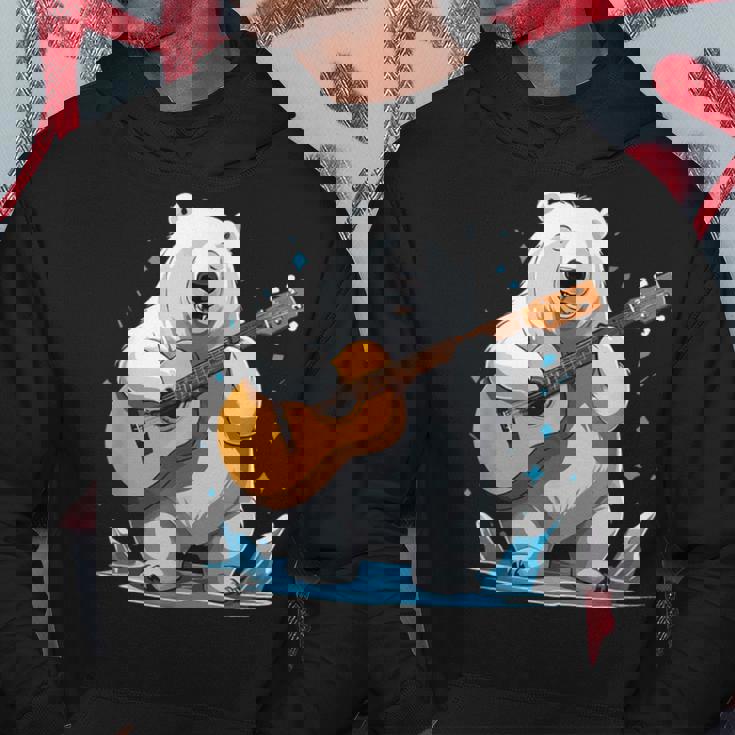 クマがアコースティックギターを弾くクマのギタリスト パーカー 面白い贈り物