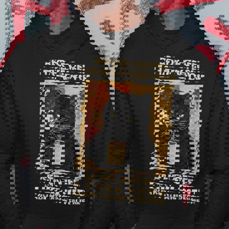 コーヒーの前にみんな嫌いな黒猫がコーヒーを飲む パーカー 面白い贈り物