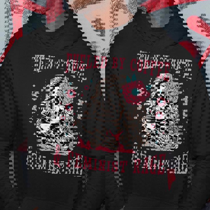 コーヒーフェミニストの怒りに支えられたスケルトンフェミニスト フェミニズム パーカー 面白い贈り物