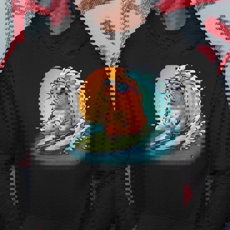 サングラスでサーフィンカピバラ パーカー 面白い贈り物