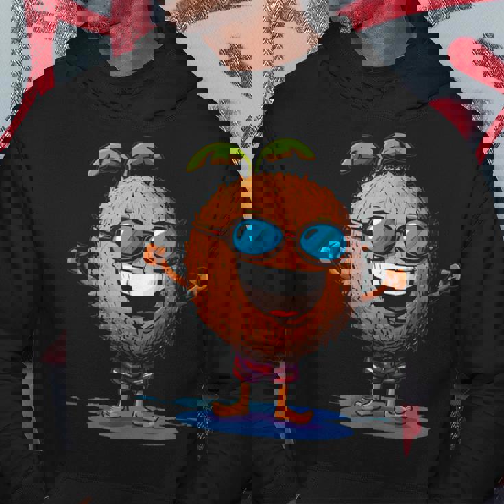 スイミングトランクとサングラスが付いた面白いココナッツ。 パーカー 面白い贈り物