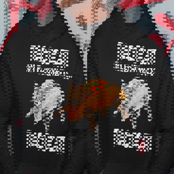 タコキャットは後ろ向きに綴られたタコキャット 愛猫とタコス パーカー 面白い贈り物