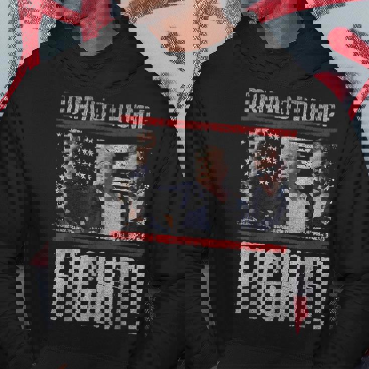 ドナルド・トランプ拳ポンプ We Fight American Flag Trump 2024 パーカー 面白い贈り物