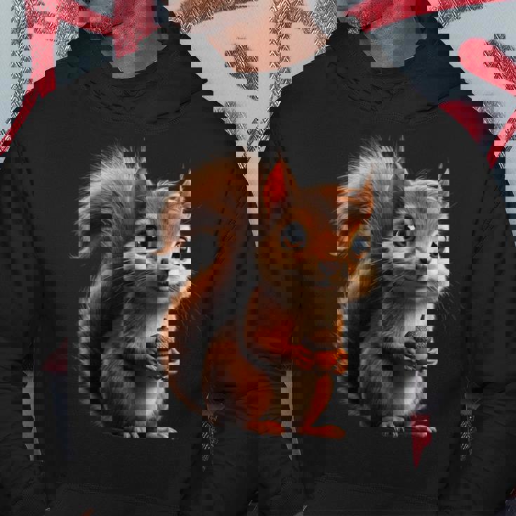 ドングリを持ったかわいいリスのデザイン パーカー 面白い贈り物