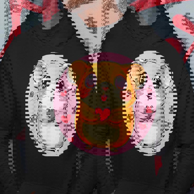 ハートに囲まれたハートを持つかわいいハムスター パーカー 面白い贈り物