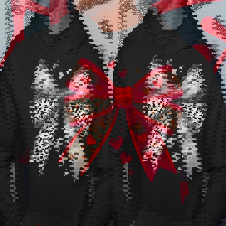 ハート付きピンクヒョウ柄リボン。 パーカー 面白い贈り物