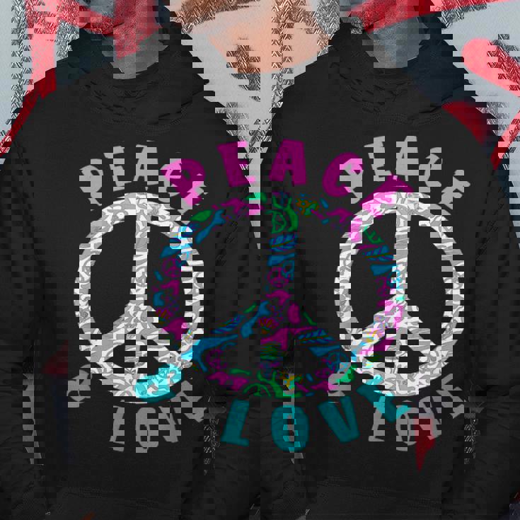 ピースアンドラブカラフルヒッピーシンボル パーカー 面白い贈り物