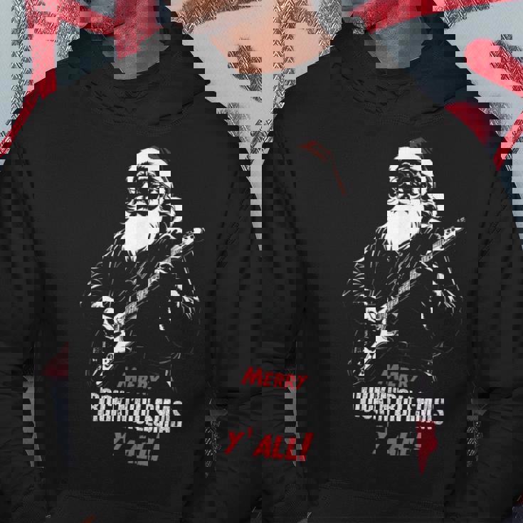 ヘヴィメタルのクリスマス、ギターを弾くサンタ パーカー 面白い贈り物