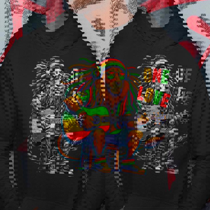 ヴィンテージ ラスタ ライオン レゲエ 音楽 One Loveibe ギター グラフィック パーカー 面白い贈り物