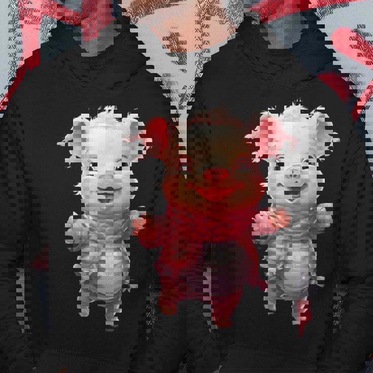 帽子とスカーフを着た豚のクリスマスプレゼント パーカー 面白い贈り物