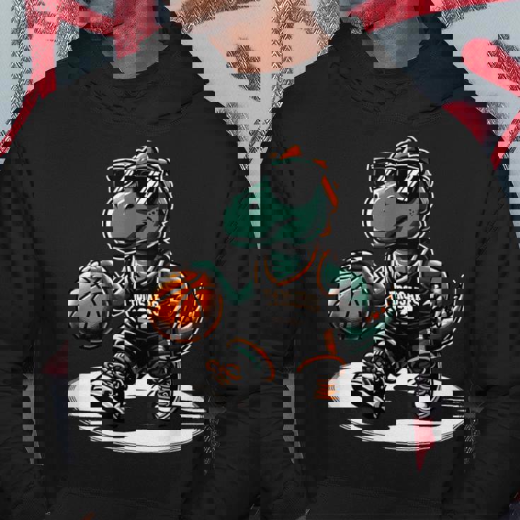 恐竜 バスケットボール T-Rex スポーツプレーヤー コーチ 面白い 男の子向け パーカー 面白い贈り物