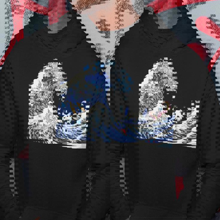 猫がサーフィンをする神奈川の大波 面白い猫の波 かわいい猫、猫好き、かわいい猫 パーカー 面白い贈り物