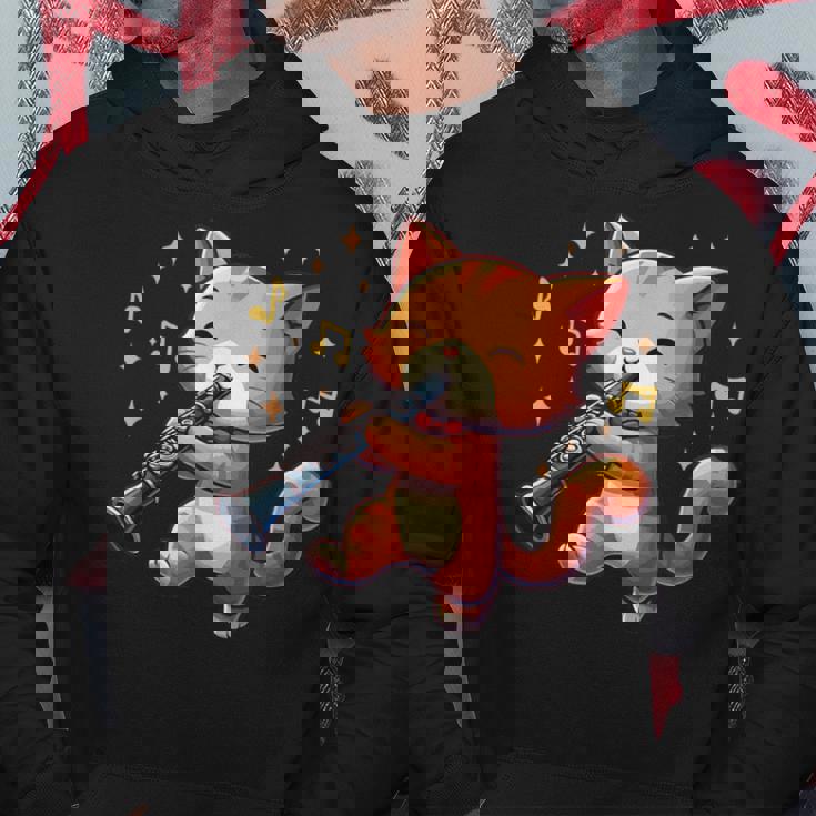 猫好きのためのかわいい猫のデザイン 猫がクラリネットを弾く パーカー 面白い贈り物