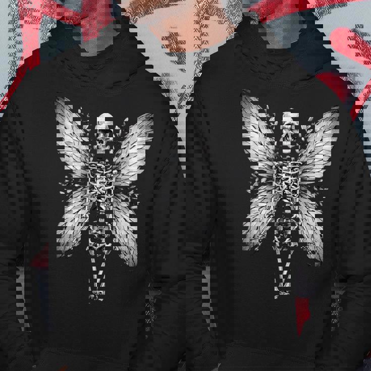 蝶の羽を持つスケルトンのイラスト パーカー 面白い贈り物