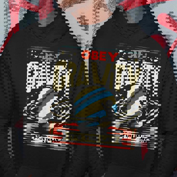 重力に従いなさい、それが法です Obey Gravity It's The Law パーカー 面白い贈り物