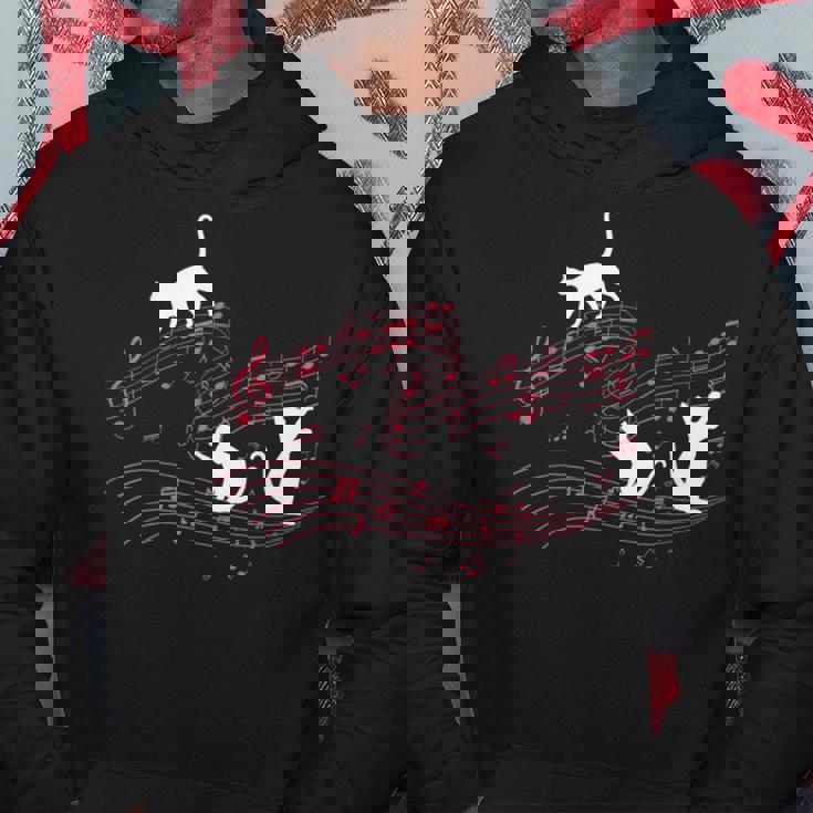 音符で遊ぶ3匹の猫 楽譜 パーカー 面白い贈り物