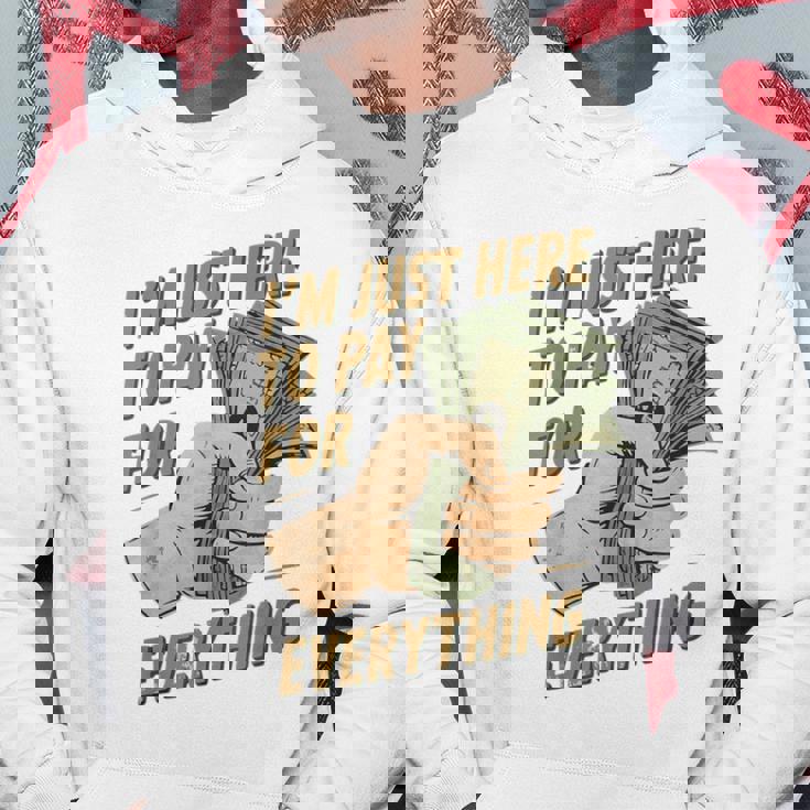 おもしろいママとパパが払うもの全部払うためにここに来たんだ パーカー 面白い贈り物