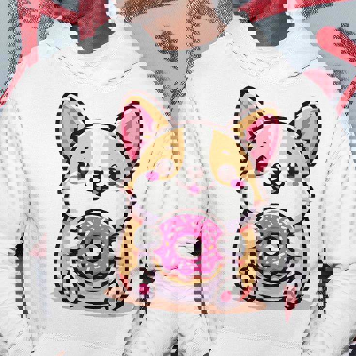 かわいいコーギーのドーナツを持つ漫画の犬愛好家アートキッズ。 パーカー 面白い贈り物