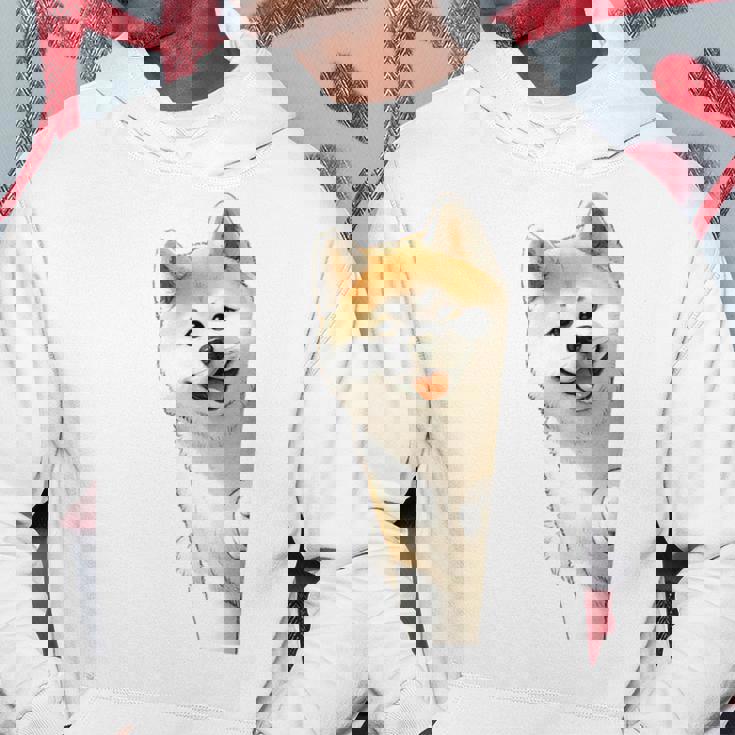 かわいい日本の秋田犬が角をのぞく犬好き。 パーカー 面白い贈り物