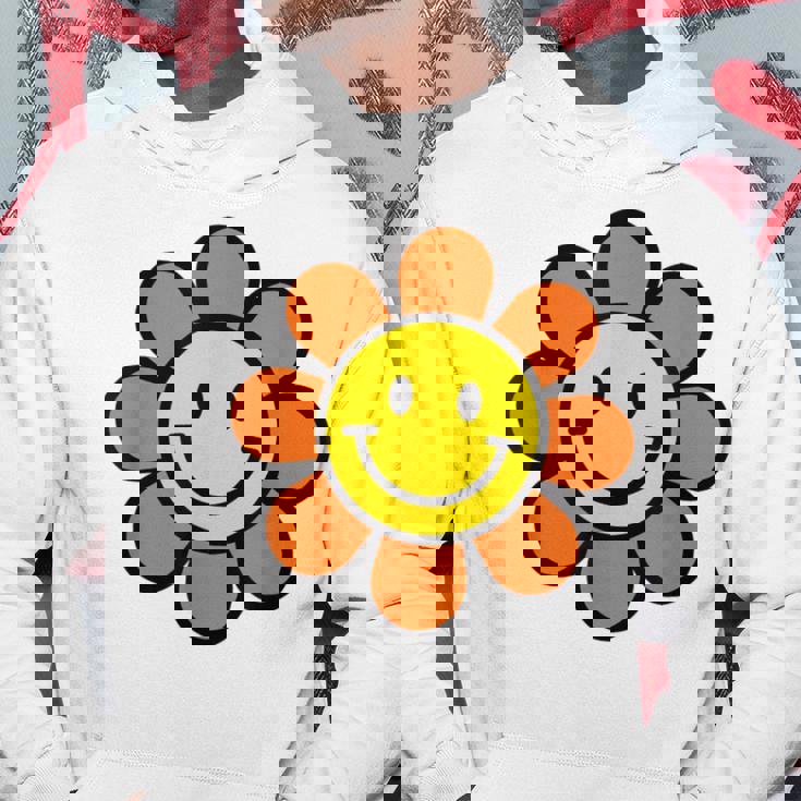 オレンジ イエロー ハッピー スマイル スマイル フェイス デイジー フラワーガール パーカー 面白い贈り物