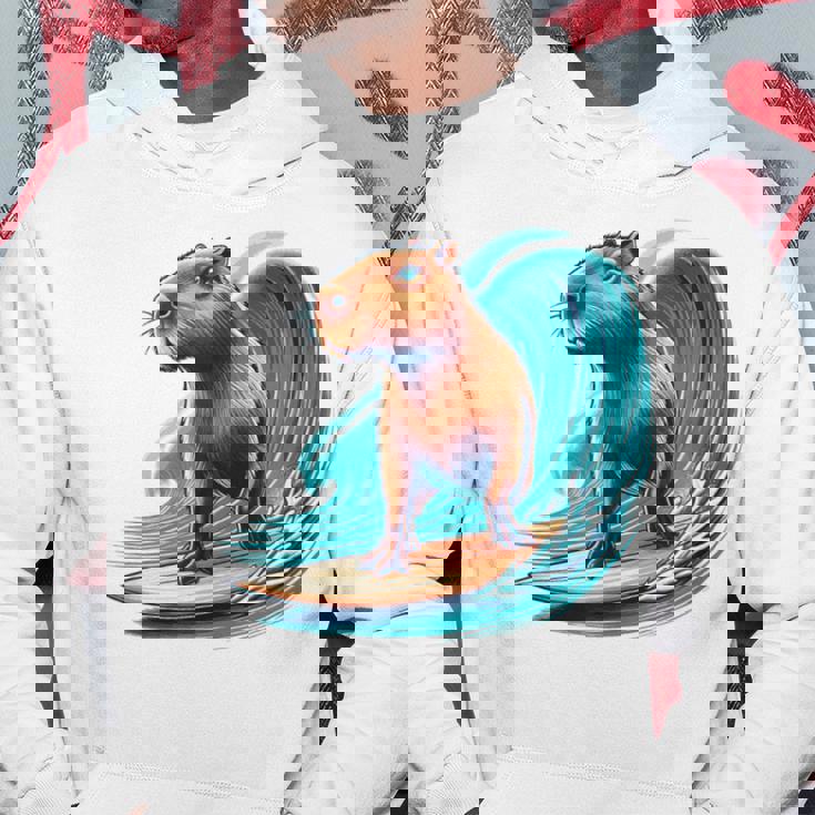 カッコイイ カピバラ サーファー サーフボード サーフィン メンズ レディース キッズ キャピー パーカー 面白い贈り物