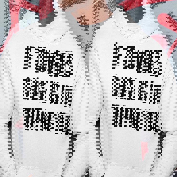 ゾンビに追われたらつまずくよおもしろいハロウィン パーカー 面白い贈り物