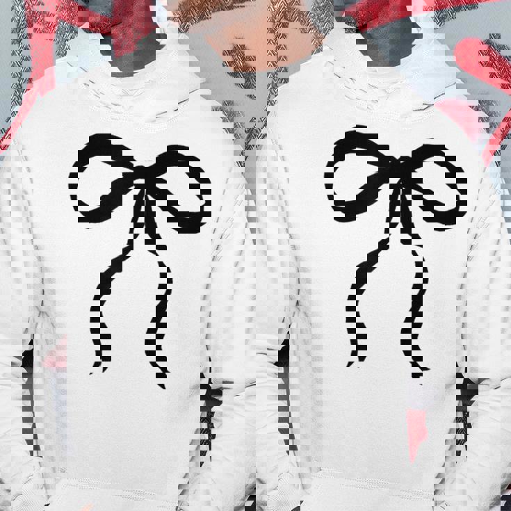 タンサンドベージュにかわいいブラックリボンリボンの美的 パーカー 面白い贈り物