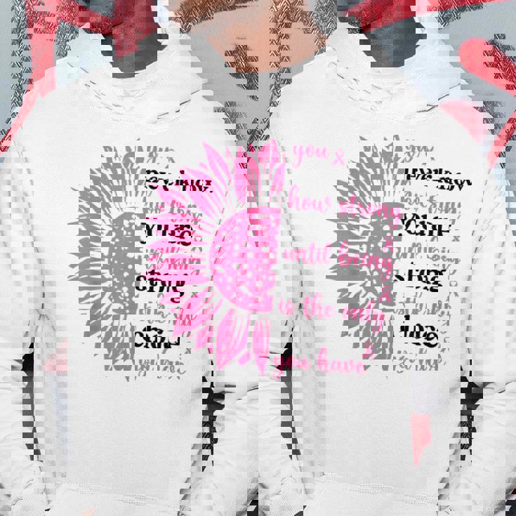 乳がんファイター サバイバー ひまわり ピンクリボン 戦士 パーカー 面白い贈り物