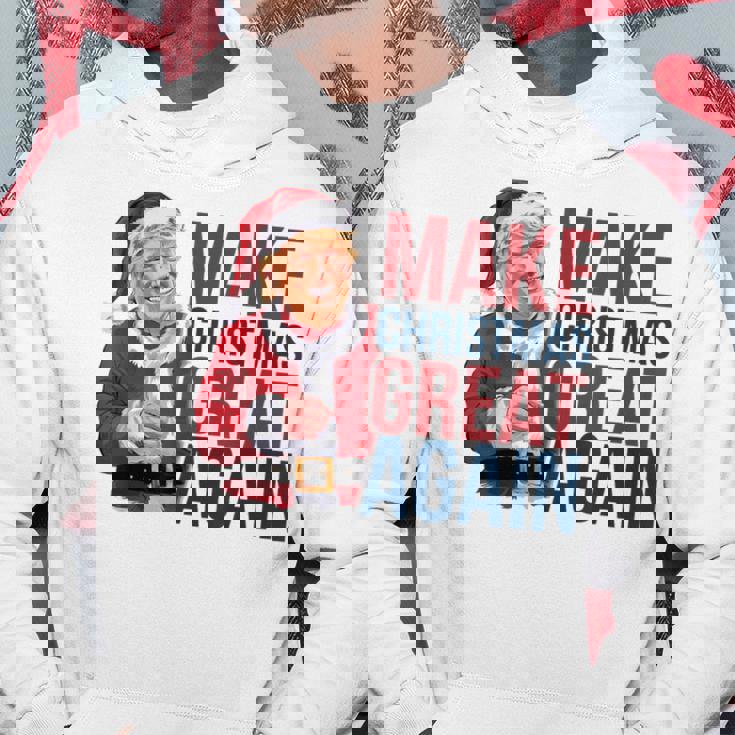 面白いクリスマスグレートアゲイントランプサンタファンusaホリデー 2024 パーカー 面白い贈り物