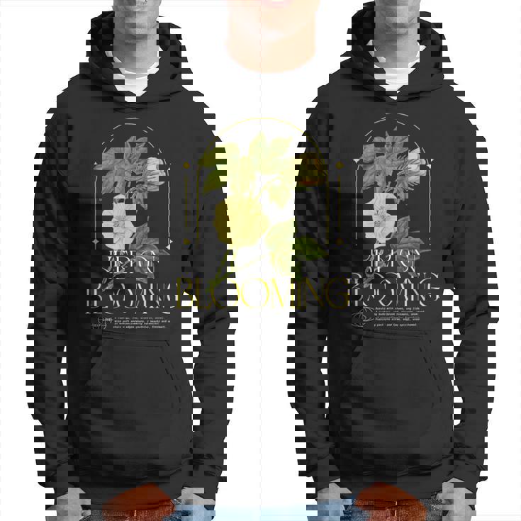 Keep On Blooming花のプリント付き パーカー