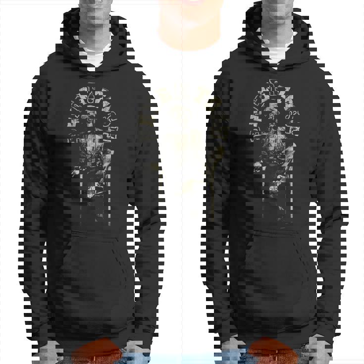 キム・ゴットレイブ・ウォーカーによる椅子に座るピーター・トッシュの写真 パーカー