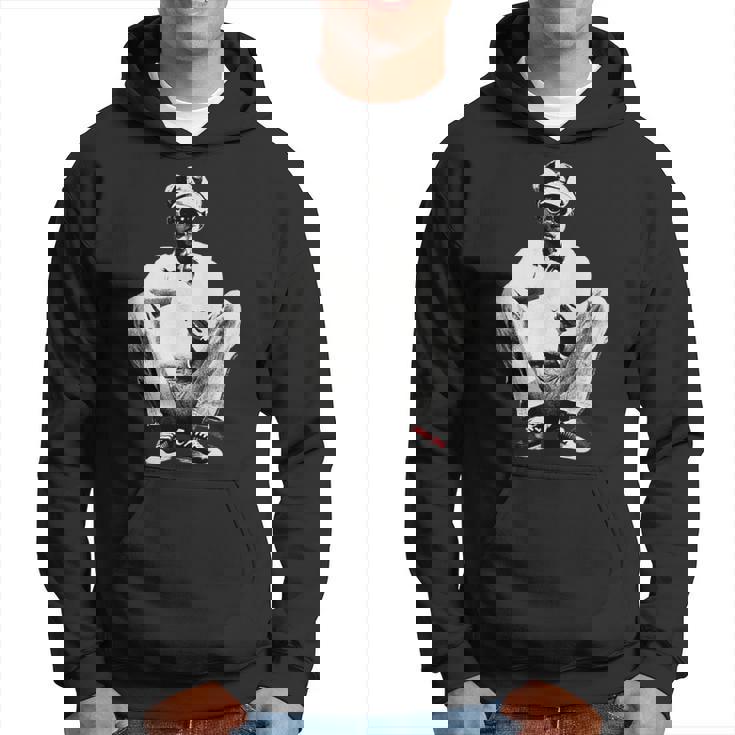 ピーター・トッシュ 座っている写真 リー・ジャフィー パーカー