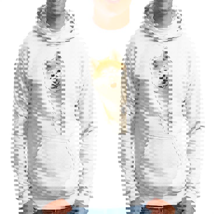 かわいい日本の秋田犬が角をのぞく犬好き。 パーカー