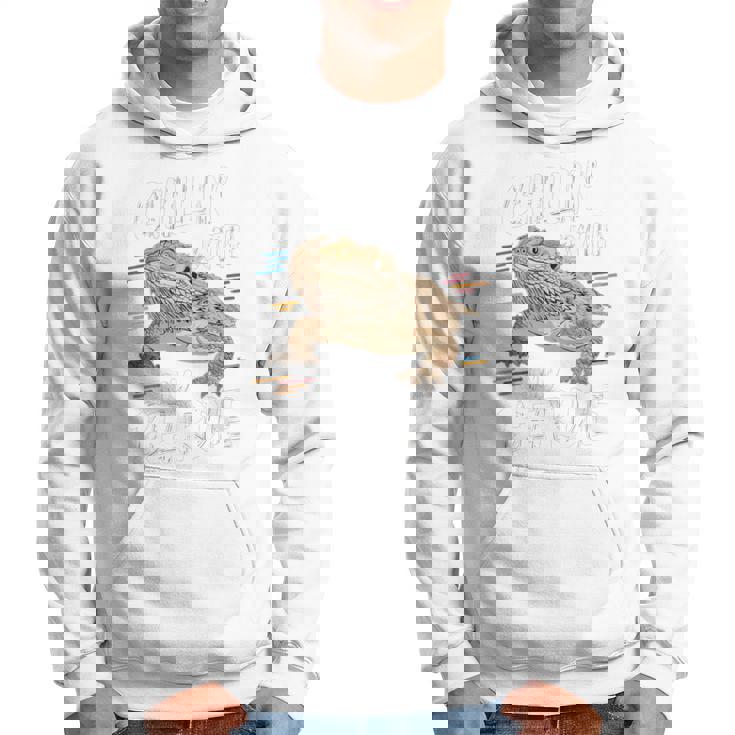 ひげを生やしたドラゴン、バルタゲーム、フトアゴヒゲトカゲ、ポゴナとくつろぐ 長袖tシャツ パーカー