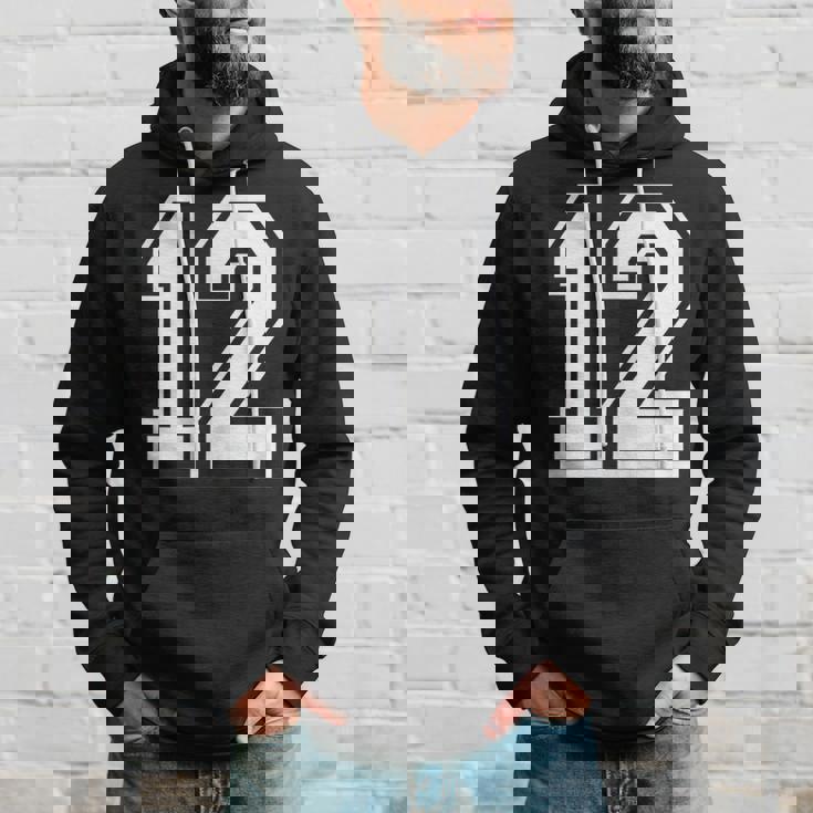 12番の前面と背面にホワイトのプリント。 パーカー 彼への贈り物