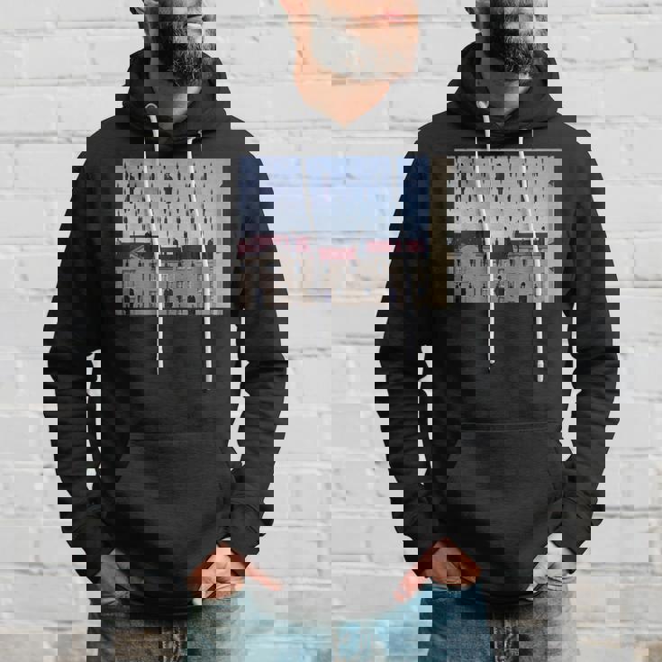 Magritteによるゴルコンダの有名な絵画。 パーカー 彼への贈り物