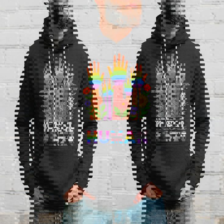 We Are All Human レインボー Lgbt Lgbtq トランスジェンダー ハンドフラワー パーカー 彼への贈り物