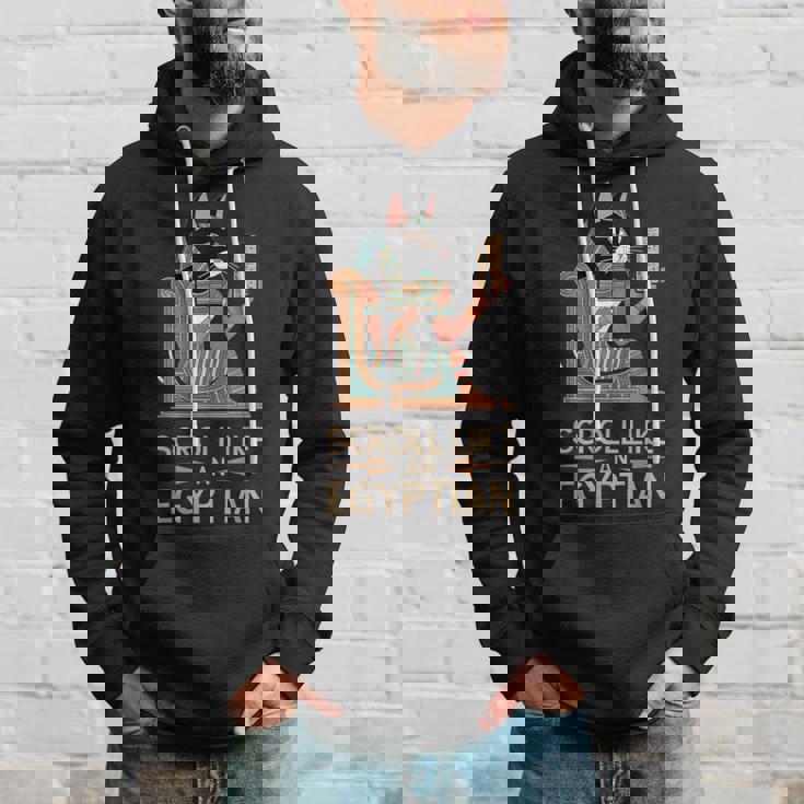 エジプトの猫のようなスクロールデザイン。 パーカー 彼への贈り物