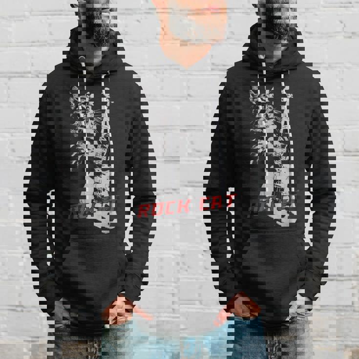 エレキギターを弾くロックキャット 面白い猫ニャーパロディショー パーカー 彼への贈り物