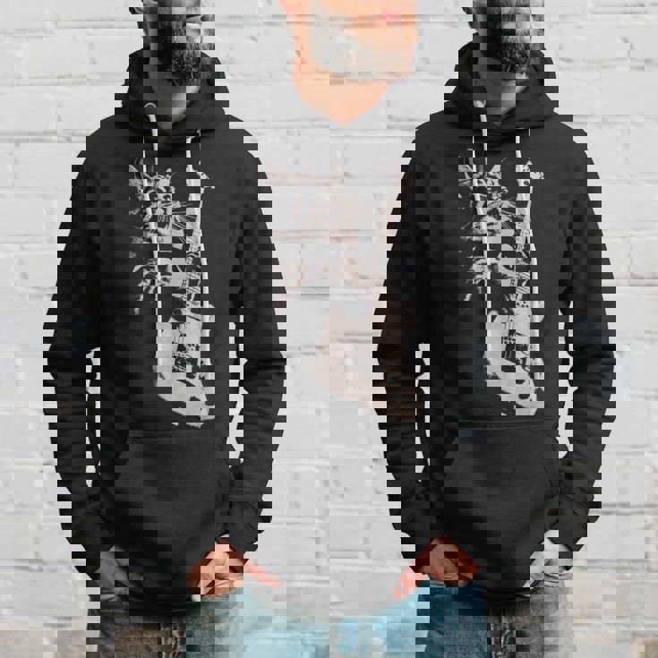 エレキギターを弾く猫 面白い猫ロッカー ロックショーで パーカー 彼への贈り物