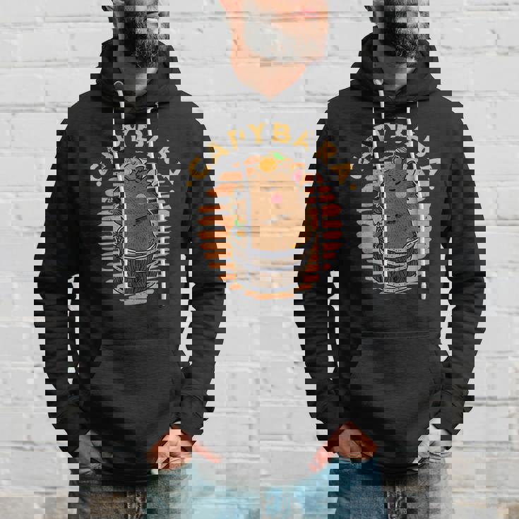 カピバラ 飼育員 動物 げっ歯類 自然 リラックス スパ パーカー 彼への贈り物