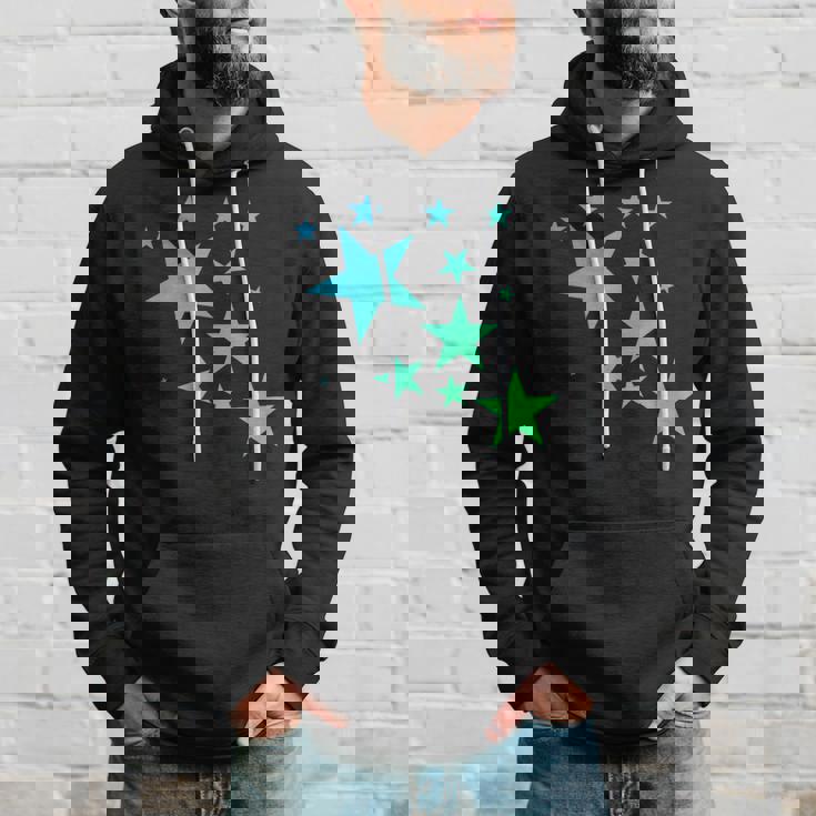 カラフルなグリーンブルーの星、星柄デザイン。 パーカー 彼への贈り物