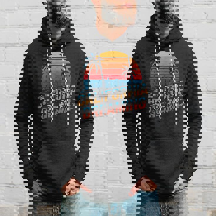 カリフォルニア ドリーミング サンセット ヤシの木 街並み パーカー 彼への贈り物