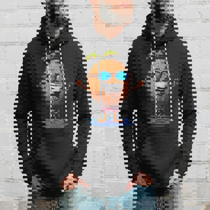 スイミングトランクとサングラスが付いた面白いココナッツ。 パーカー 彼への贈り物