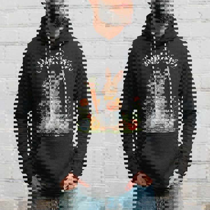 ハッピーイースターバニーニンジンイースターエッグ イースターラビットアートワーク パーカー 彼への贈り物