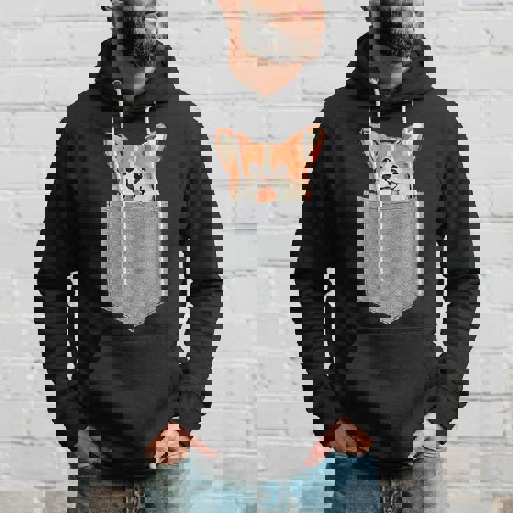 ポケットから覗く可愛いコーギーのデザイン パーカー 彼への贈り物